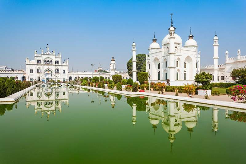 A picture of the Chota Imambara in Lucknow, with a man-made fountain in the foreground